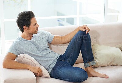 Buy stock photo Sad man, depression and thinking on a sofa with stress, anxiety or broken heart at home. Fail, crisis or male person in living room overthinking, disaster or lonely, worried or disappointed in house
