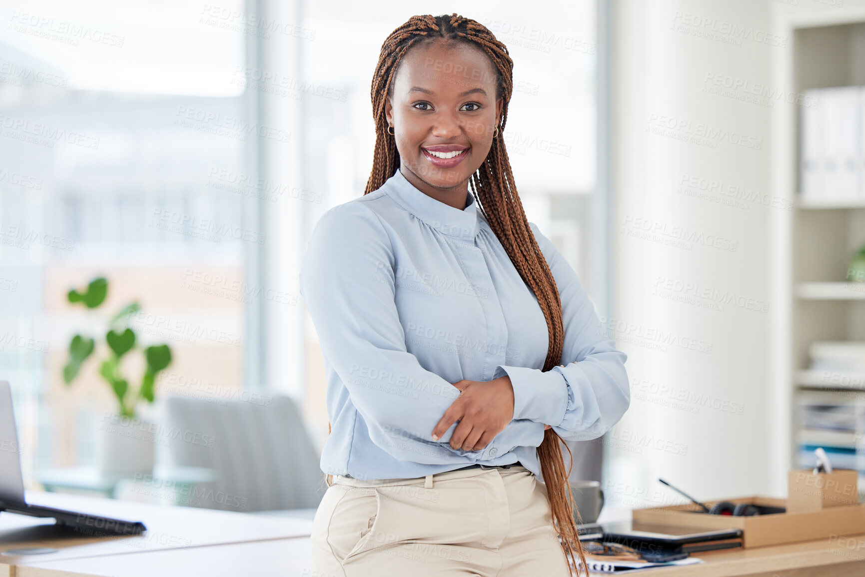 Buy stock photo Smile, crossed arms and professional black woman at office with positive, good and confident attitude. Happy, smart and portrait of young African female attorney with law career at modern workplace.