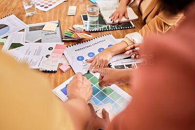 Buy stock photo Hands, documents and marketing with a designer team working on a creative project together in the office. Meeting, data and strategy with a group of design people at work in the boardroom closeup