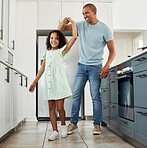 Love, kitchen and dad dancing with kid in a in a home for care, happiness and bonding together in a house. Laughing, parent and father playing with girl or child as support spinning with energy