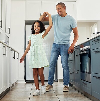 Buy stock photo Love, kitchen and dad dancing with kid in a in a home for care, happiness and bonding together in a house. Laughing, parent and father playing with girl or child as support spinning with energy