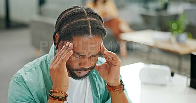 Buy stock photo Headache, tired and burnout businessman with pain, working on laptop in office with stress and anxiety. Fatigue, depression and mental health risk of a black man or employee while frustrated or angry