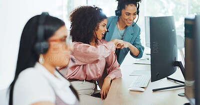 Buy stock photo Fist bump, business and women in call center for customer service, CRM support and consulting in office. Happy, coworking team and people celebrate success for telemarketing, communication and sales