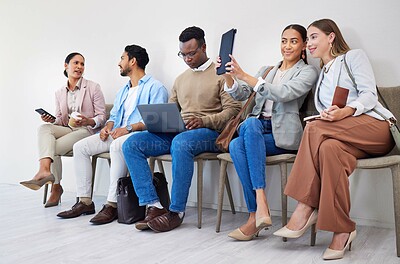 Buy stock photo Group of people, waiting room and interview at job recruitment agency with laptop, tablet and resume. Human resources, hiring and business men and women in lobby together with career opportunity.