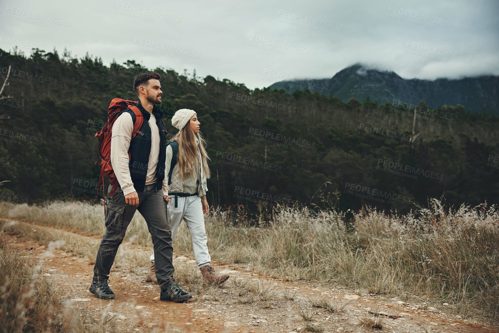 Buy stock photo Backpack, fitness and couple hiking in nature with peace, love and bonding on forest adventure. Freedom, travel and active people outdoor walking, calm and enjoy weekend journey together on vacation