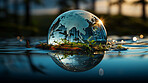 Planet, water and globe in forest for Earth day, environment protection and save environment water. Nature, support and world habitat for climate change awareness, green energy or sustainability help