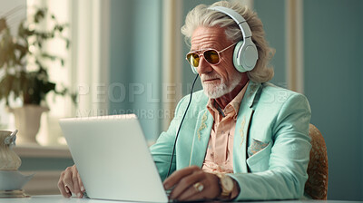 Buy stock photo Senior man, headphones on and working on laptop in vibrant attire. Tech-savvy, focused and stylish elder in a modern setting. On a creative journey with a touch of vibrant energy.