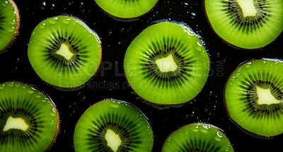 Healthy, natural or kiwi fruit on a black background in studio for farming, produce and lifestyle. Fresh, summer food or sliced health snack mockup for eco farm, diet and agriculture with droplets