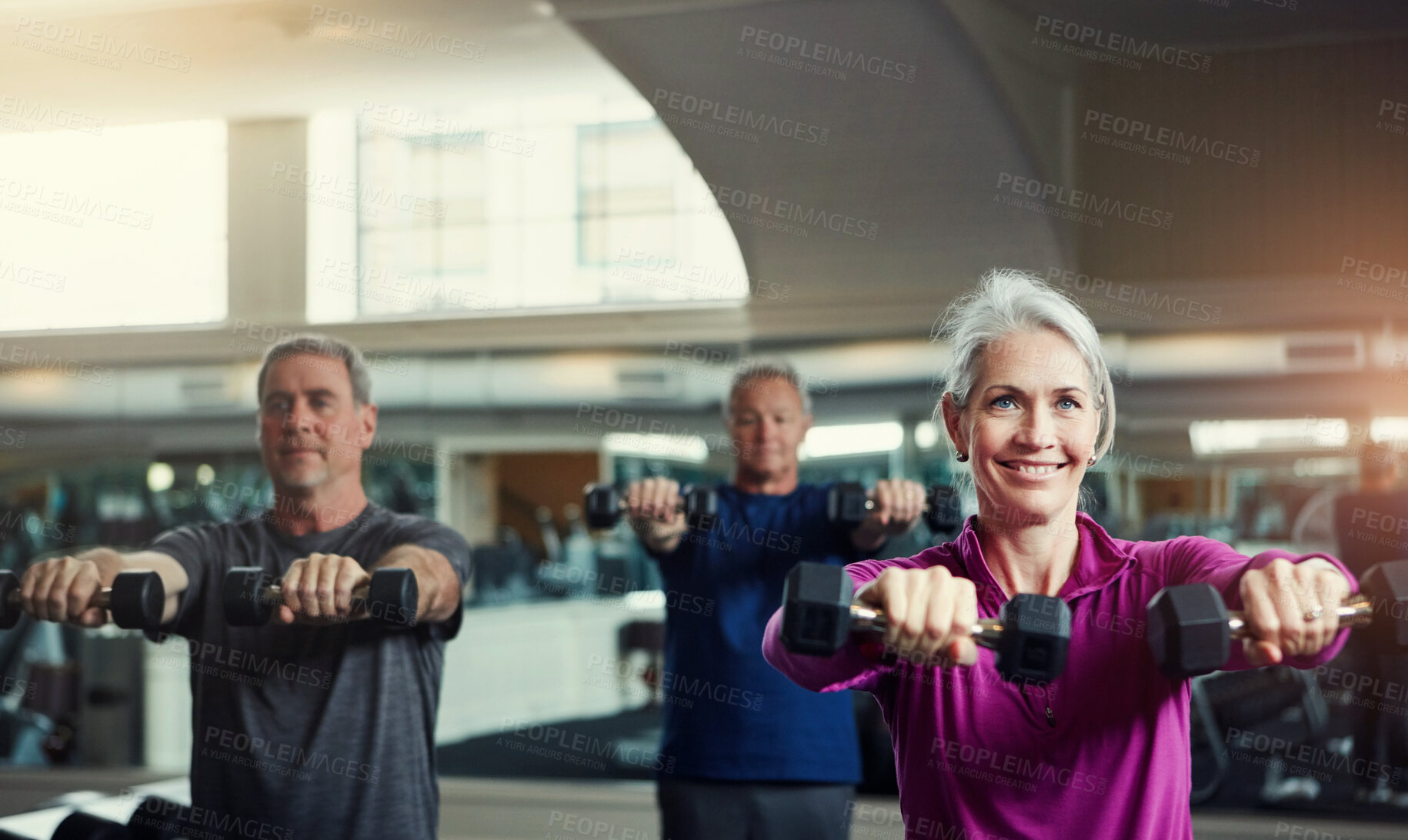 Buy stock photo Senior fitness club, dumbbells and people at gym for training, health and wellness, sport or exercise. Class, workout and elderly group of friends at a studio for hand weight, cardio or weightlifting