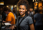 Happy woman, worker and portrait with smile for management, small business or casino staff. Positive, confident and proud person for retail, restaurant and service industry with evening lights