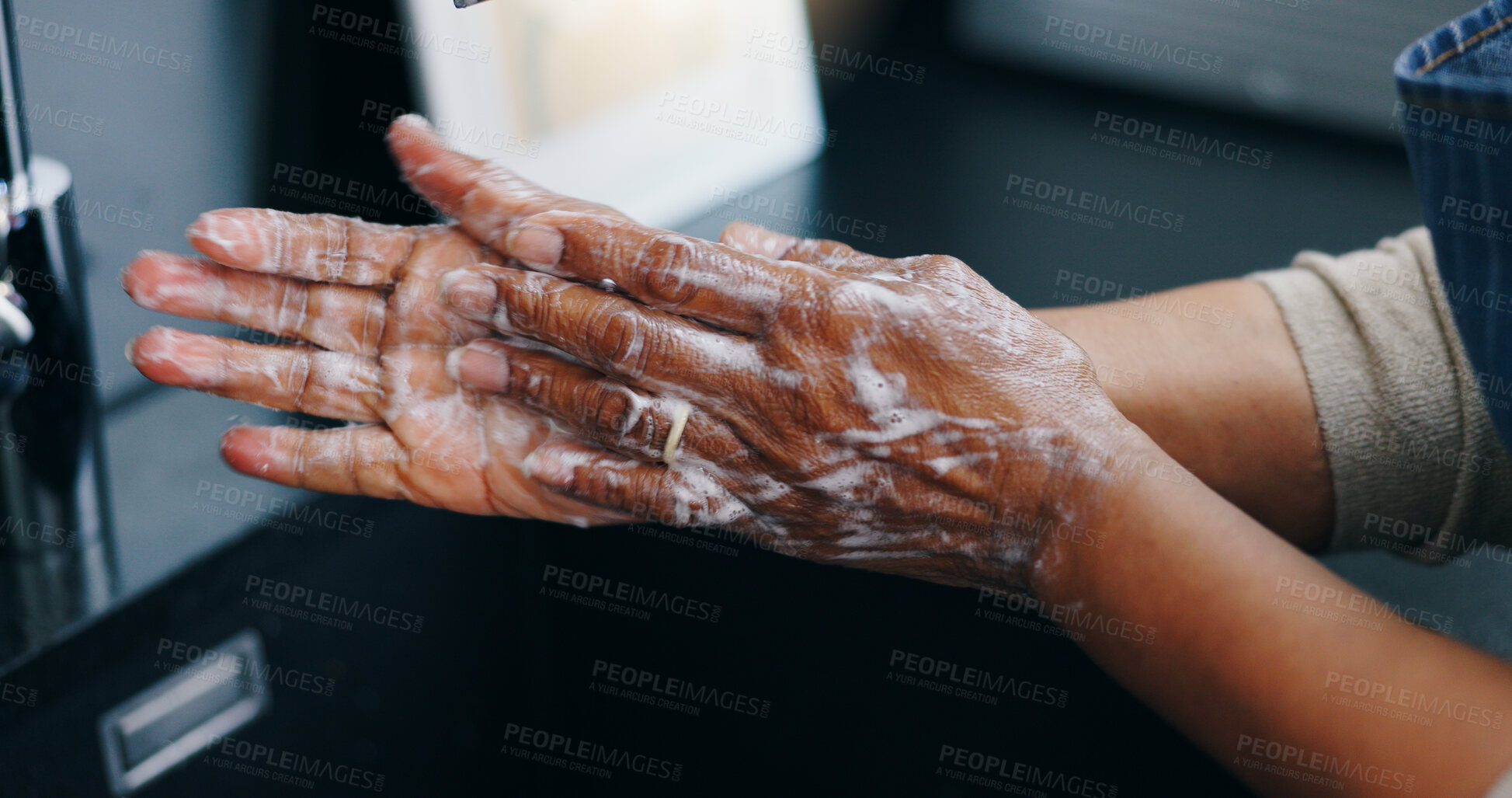 Buy stock photo Person, soap and washing hands for hygiene, germ or bacteria removal by tap or sink at home. Closeup of palm in skincare, protection or soapy skin for cleaning, dirt or disinfection by basin at house