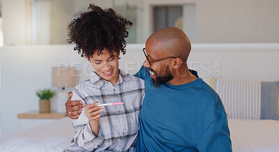 Buy stock photo Happy couple, bed and positive pregnancy test for family, start or maternity at home. Face of excited man and pregnant woman smile for parenthood, morning or good news or results in bedroom together