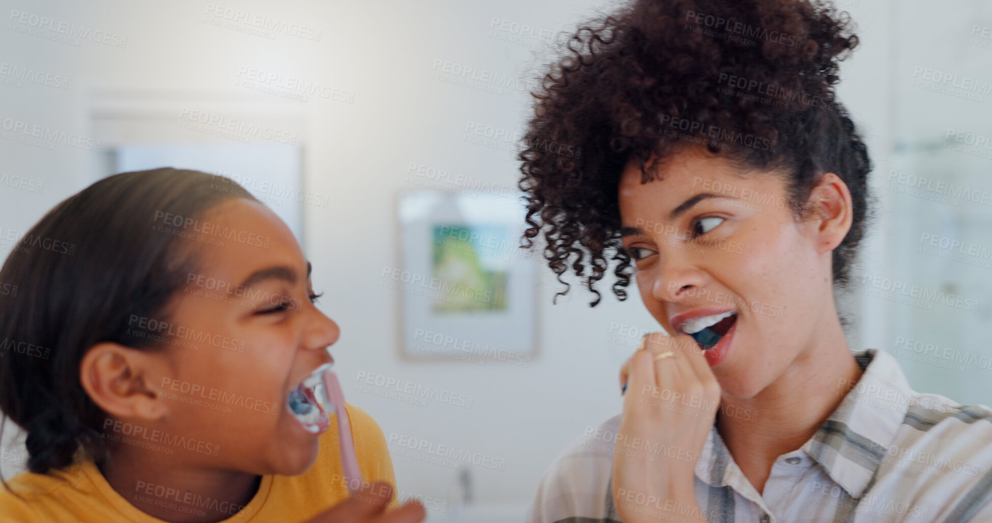 Buy stock photo Hygiene, bathroom and mother brushing teeth with child for oral health and wellness at home. Bonding, happy and young mom and girl kid with morning dental care routine together at house in Mexico.