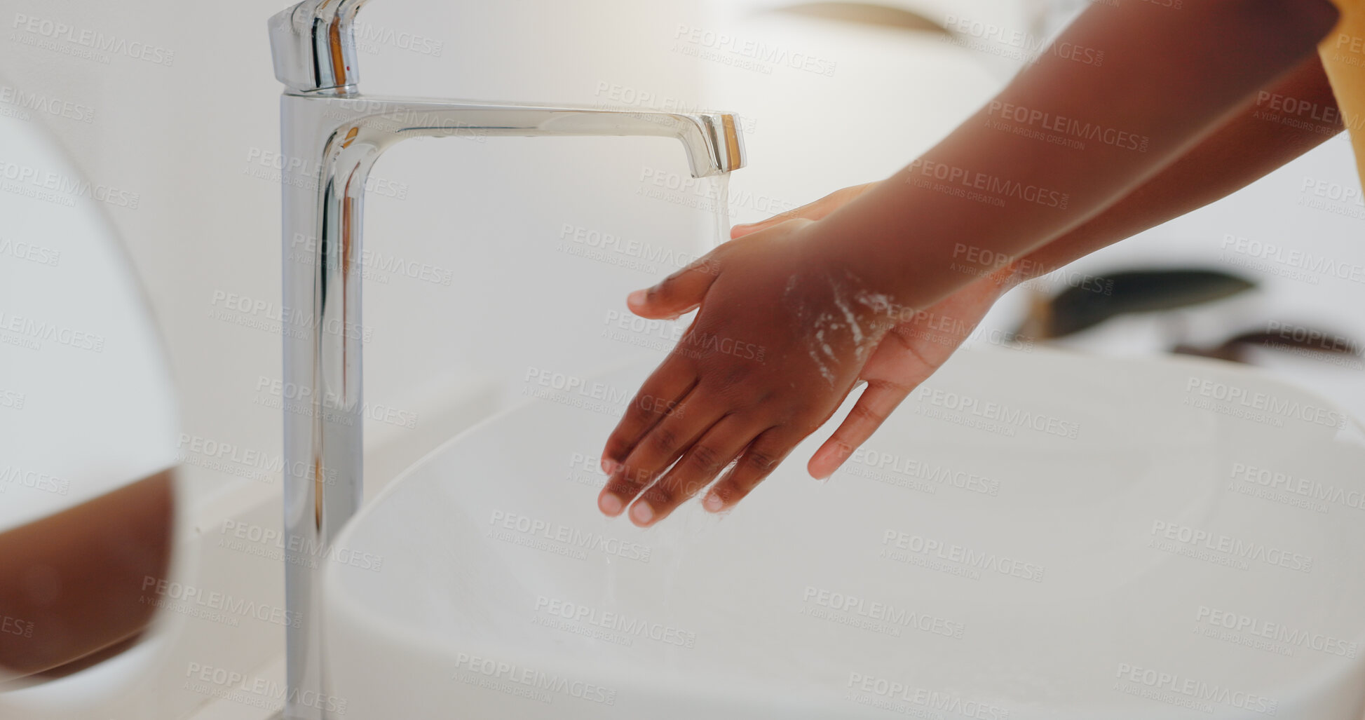 Buy stock photo Child, tap and washing hands in water for hygiene, cleaning or bacteria or germ removal in sink at home. Closeup of kid rinsing soap in bathroom basin for disinfection, care or cleanliness at house