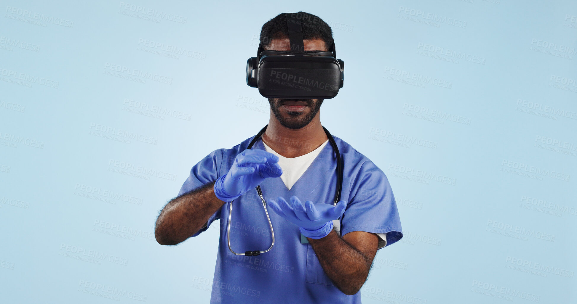 Buy stock photo Doctor, man and virtual reality glasses for surgery, healthcare innovation and surgeon on a blue studio background. Person, medical and professional with VR eyewear, future and tech with digital app