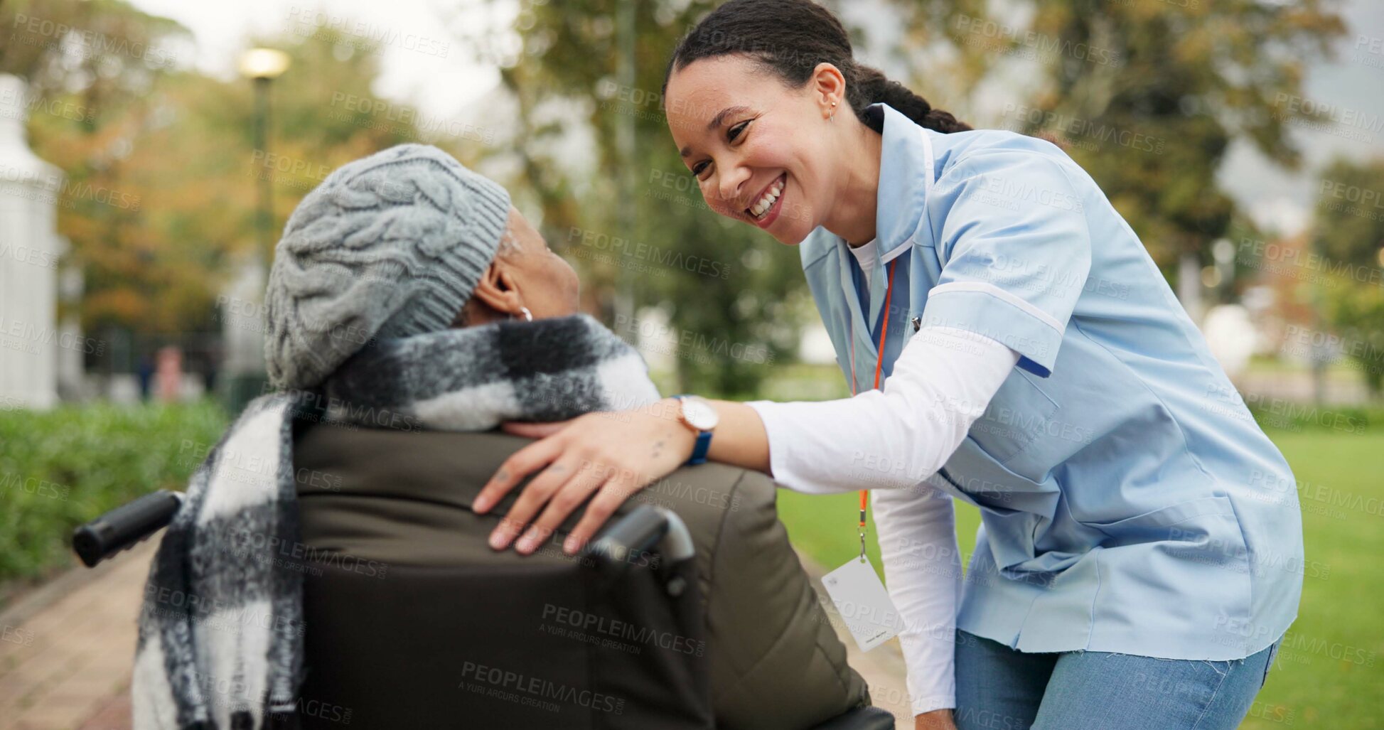 Buy stock photo Nurse, happy and park with old woman in a wheelchair for retirement, elderly care and physical therapy. Trust, medical and healthcare with senior patient and caregiver in nature for rehabilitation