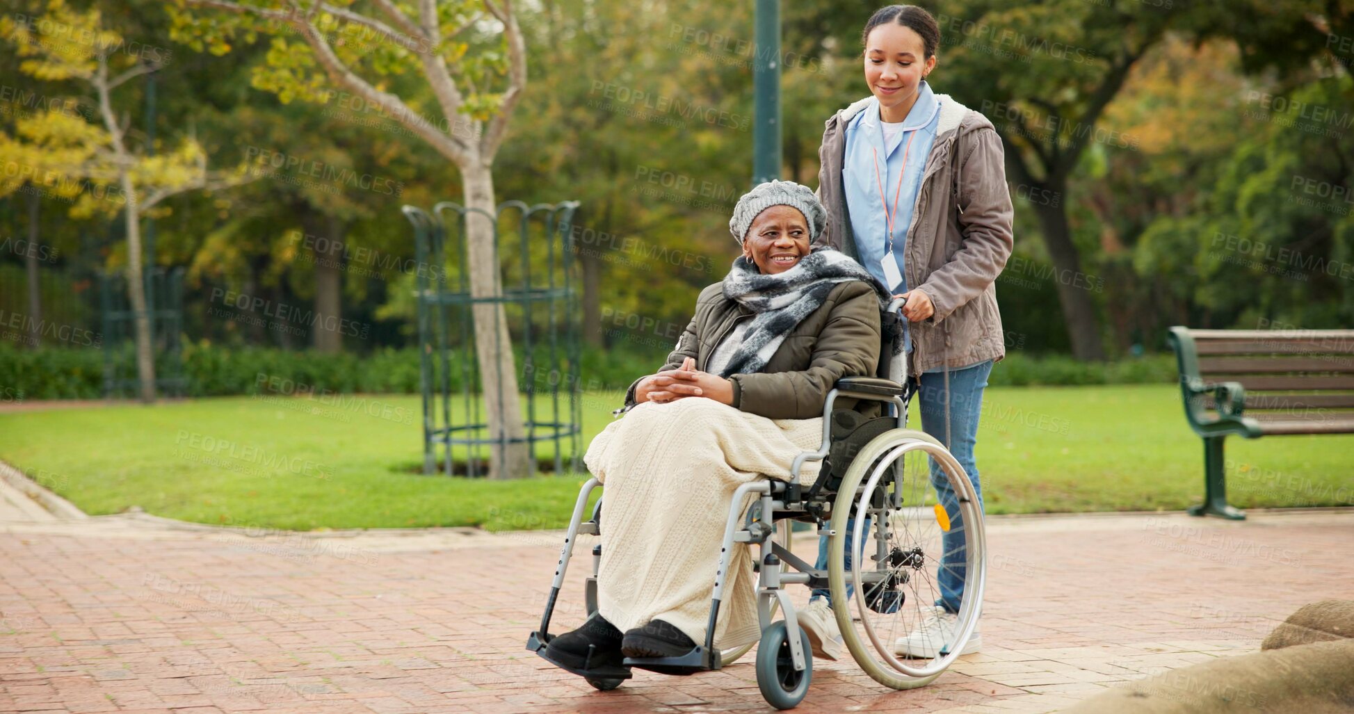 Buy stock photo Nurse, peace and park with old woman in a wheelchair for retirement, elderly care and physical therapy. Trust, medical and healthcare with african patient and caregiver in nature for rehabilitation