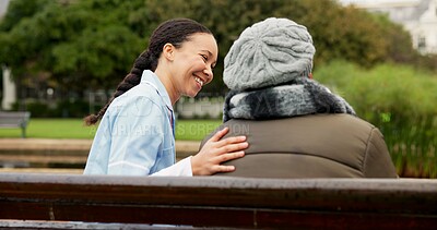 Nurse, happy and support with old woman on park bench for retirement, elderly care and conversation. Trust, medical and healthcare with senior patient and caregiver in nature for rehabilitation