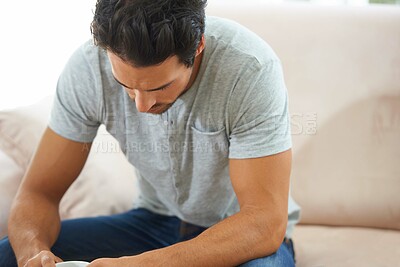 Buy stock photo Thinking, depression and sad man on a sofa with stress, anxiety or broken heart at home. Fail, crisis or male person in living room overthinking, disaster or lonely, worried or disappointed in house