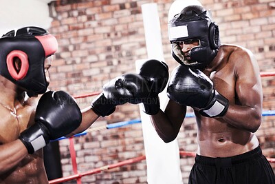 Buy stock photo Man, boxer and fighting in ring at gym for workout, exercise or indoor self defense training together. Male person, fighter or sports trainer boxing with sparing partner in competition or practice