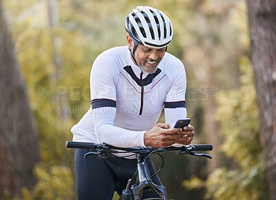 Buy stock photo Nature cycling, phone and happy man, sports athlete or bike rider check digital map, GPS location or direction. Woods, cellphone and cyclist smile for online bicycle info, forest connectivity or app