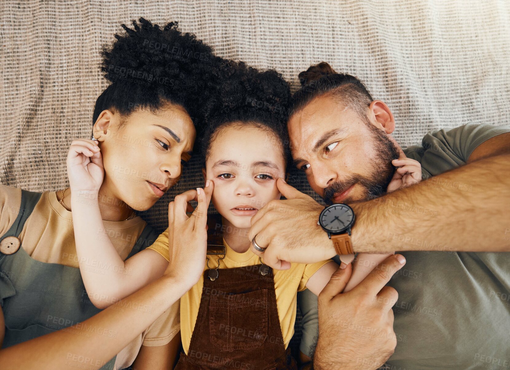 Buy stock photo Love, comfort and parents with crying child on floor for empathy, support or care from above. Depression, anxiety and kid face with parents for bullying, crisis or cry, sad or help with mental health