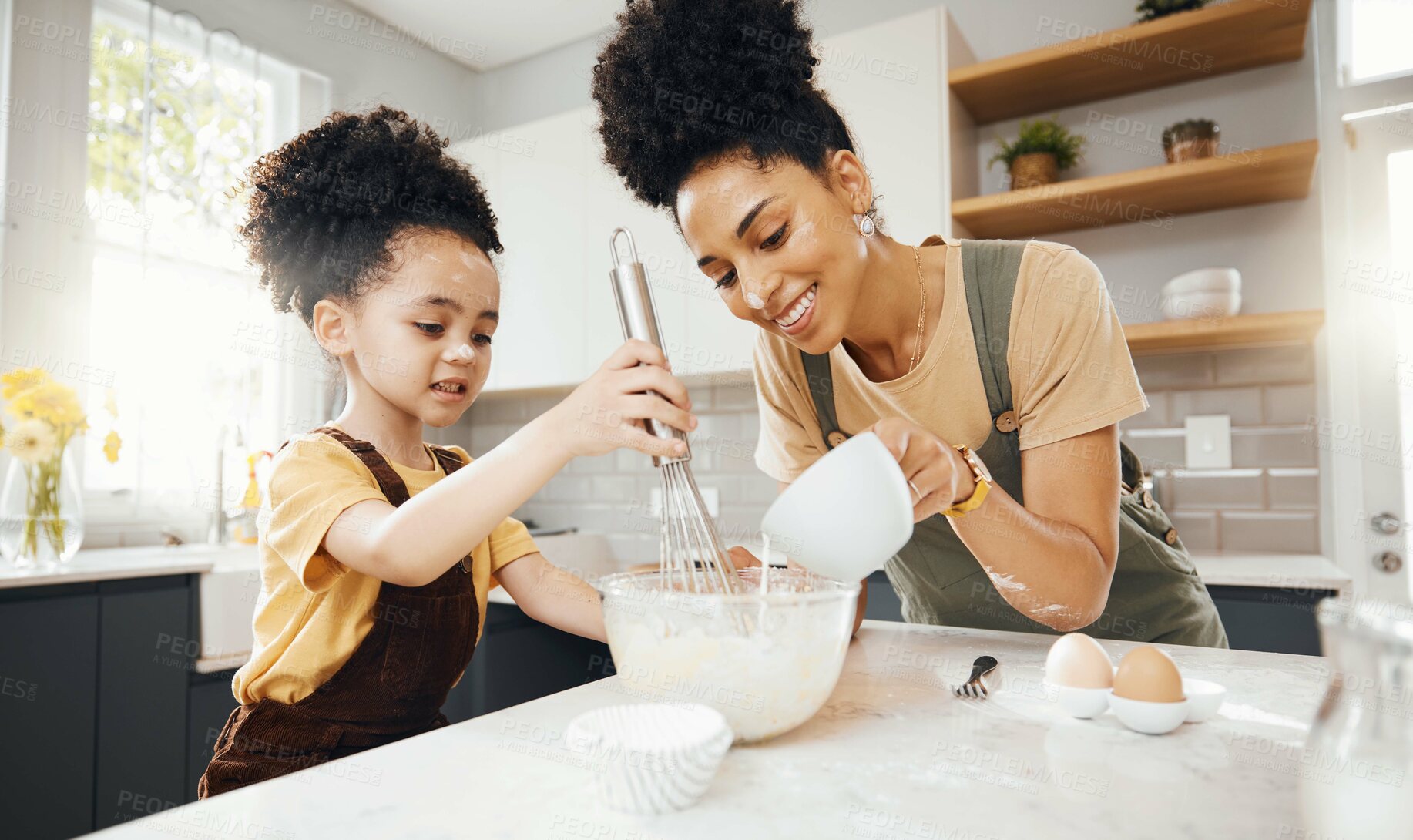 Buy stock photo Child, mother and baking in kitchen, teaching and learning with support, development and breakfast. Cupcake, cooking and boy chef helping happy mom, mixing bowl for milk and eggs recipe in morning.