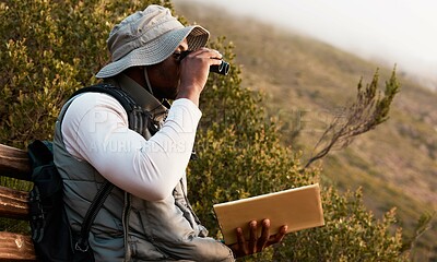 Buy stock photo Book, binocular or man bird watching in nature on trekking adventure journey for wellness or peace. Hiking, holiday vacation or African person on bench to relax or looking to search in park for view