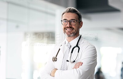 Buy stock photo Happy doctor, portrait and man with arms crossed in hospital for healthcare, wellness or career. Face, medical professional smile and confident surgeon, expert or mature employee in glasses in Canada
