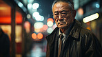 Asian man, portrait and businessman or senior, entrepreneur and professional in city street. Serious, looking and urban with male wearing a business suit for leadership, marketing and success at night