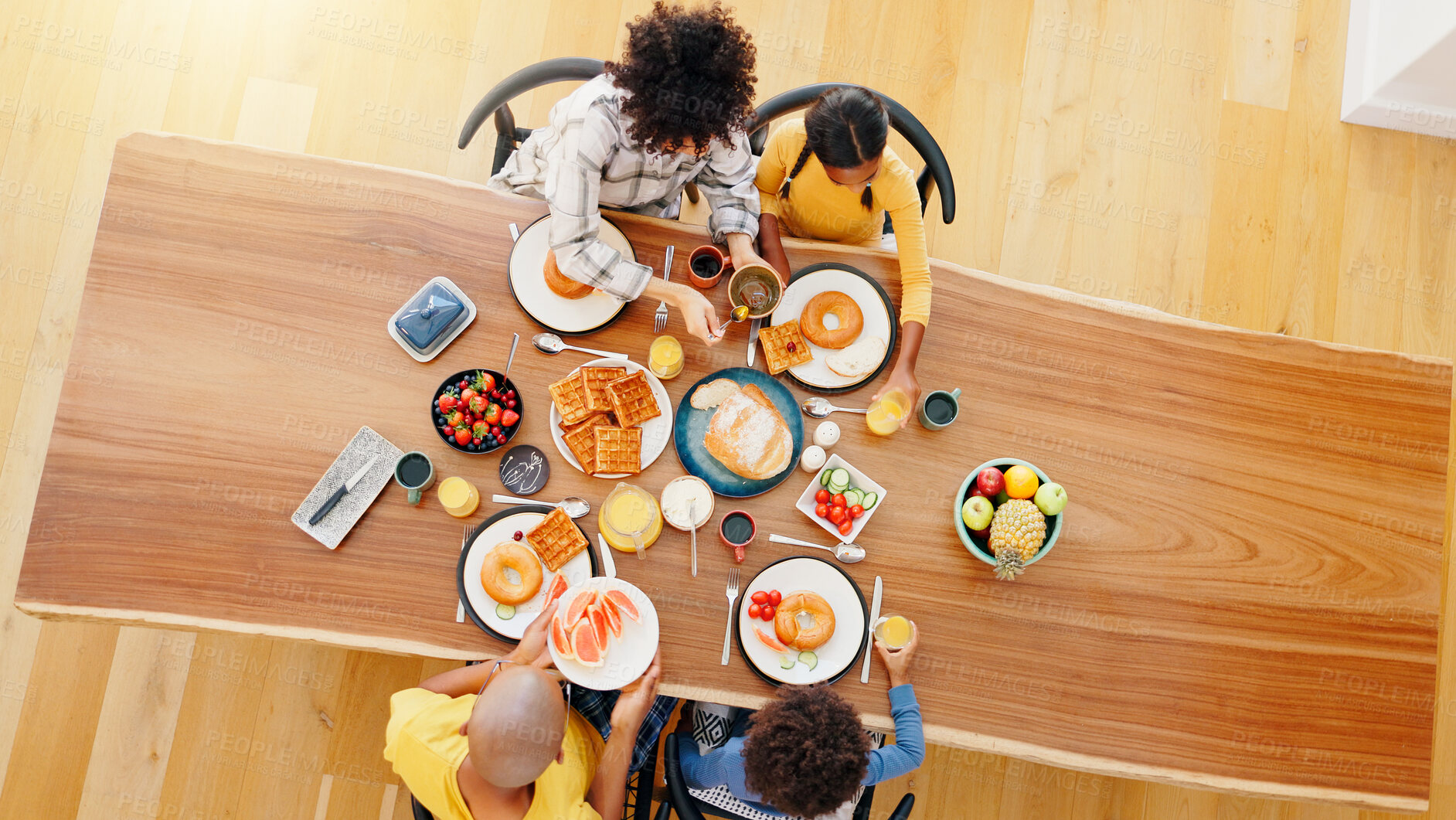 Buy stock photo Family, food and top view of parents with children for breakfast, lunch and eating together. Meal time, bonding and  people are hungry for nutrition and cuisine at home, healthy with love and care