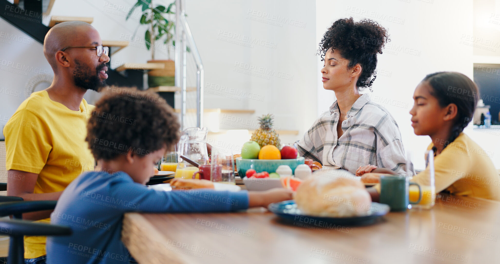 Buy stock photo Black family, food and parents with children in prayer for breakfast, lunch and eating together. Home, religion and people worship for bonding with meal for health, nutrition and hunger in house