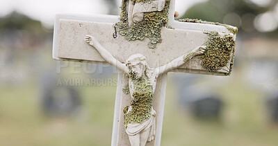 Funeral, tombstone or Jesus Christ on cross in cemetery for death ceremony, religion or memorial service. Symbol, background or Christian sign on gravestone for burial or loss in public graveyard