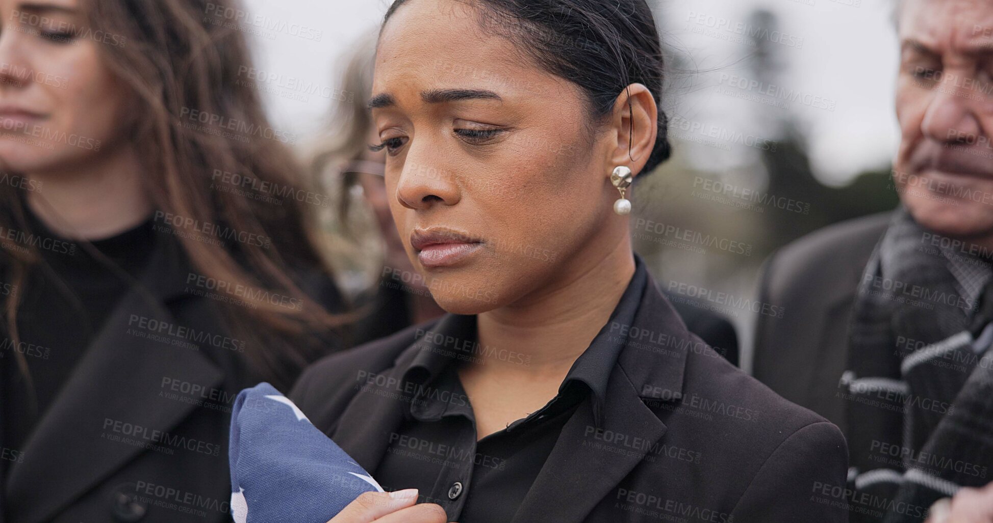 Buy stock photo People, sad and woman with grief, funeral and loss with death, compassion and depression. Person, family or wife with a flag, loved one or pain with stress, goodbye or respect with mourning or burial