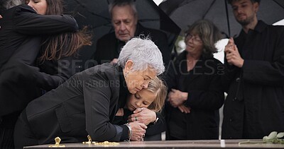 Buy stock photo Funeral, crying family and child hug grandmother for support, mourning depression and death at emotional burial event. Dead, love and kid hugging senior woman, grandma and grief at farewell ceremony