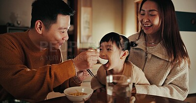 Buy stock photo Food, home and Japanese parents and child at table for lunch, breakfast and eating meal together. Happy family, culture and mother, father and young girl in house for bonding, relationship and love