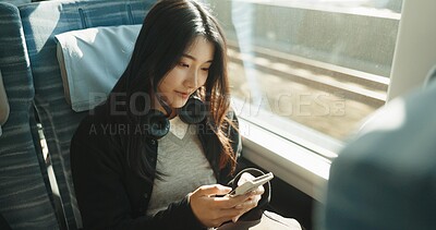 Buy stock photo Japan woman, travel and train on smartphone, social media and public transportation on metro bullet. Person, cellphone and online on fast vehicle for weekend trip and commute in tokyo for adventure