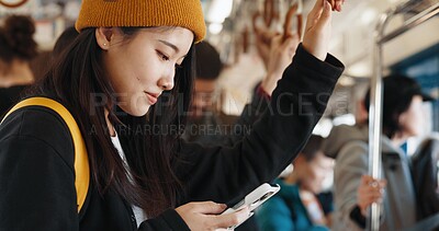 Buy stock photo Japanese woman, online and train on smartphone, social media and public transportation on metro bullet. Person, cellphone and travel on fast vehicle for weekend trip and commute in tokyo on adventure