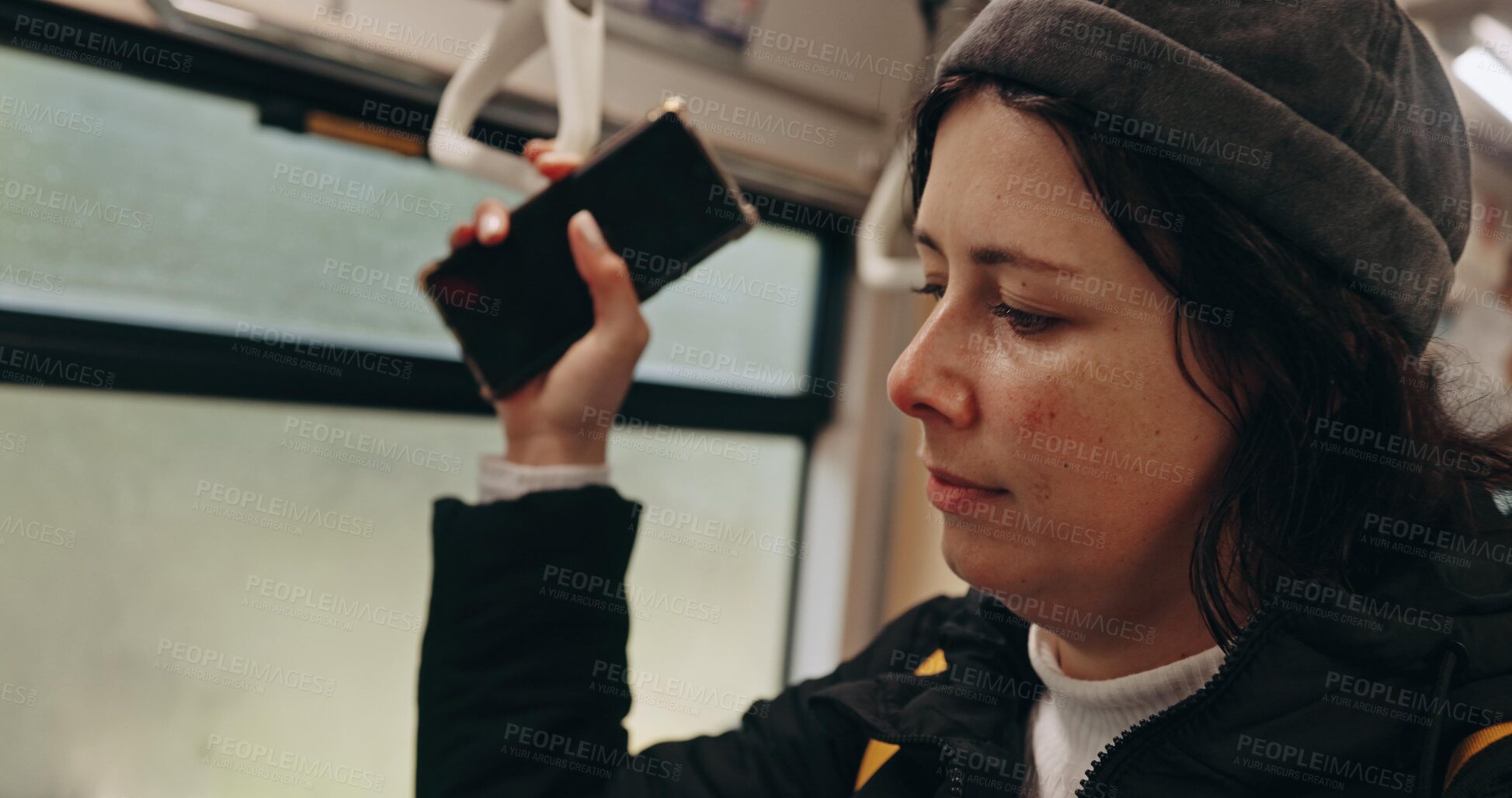 Buy stock photo Woman, phone and thinking in train, travel and hand holding handle for balance, safety and memory. Girl person and smartphone with ideas, vision or public transport on railway infrastructure in Tokyo