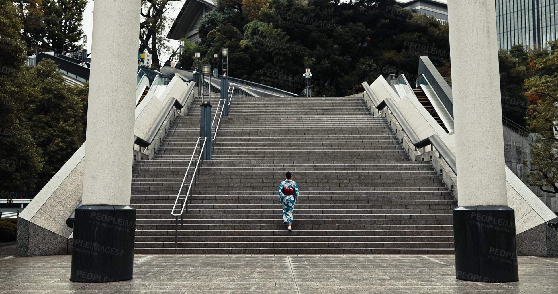 Buy stock photo Japan, woman and kimono outdoor on stairs for wellness, heritage celebration and culture in Tokyo city. Sanno Torii, person and walking on steps for travel, spiritual journey and traditional fashion