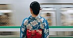 Woman, Japanese train station and kimono traditional dress for transport, journey or metro railway. Commute, motion blur and travelling on urban platform, locomotive in Tokyo and female person