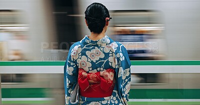 Buy stock photo Japan woman, travel and train station in kimono and public transportation on metro bullet in city. Person, motion blur or traditional clothes by fast vehicle or subway in tokyo on urban adventure