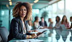 Woman, boardroom and business portrait in an office for collaboration, teamwork and corporate meeting. Confident, female executive sitting together for support, strategy and leadership in workplace