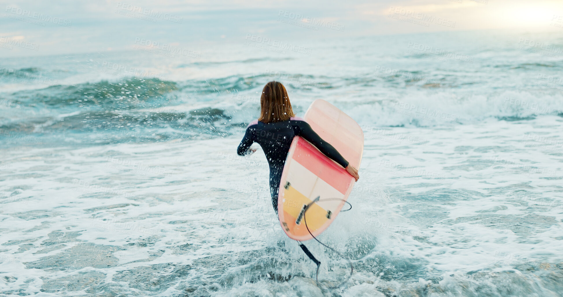 Buy stock photo Surfing, beach and woman in water for surfboard for sports, fitness and freedom by ocean. Nature, travel and back of person running in sea for wellness on holiday, vacation and adventure for hobby