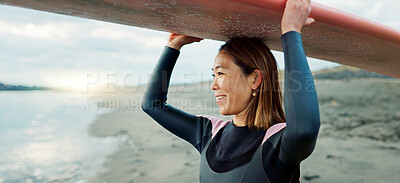 Buy stock photo Woman, surfer with surfboard at beach and view of ocean, nature and extreme sports for fitness. Asian, athlete and smile for exercise and surfing at sunrise, workout or training for hobby outdoor