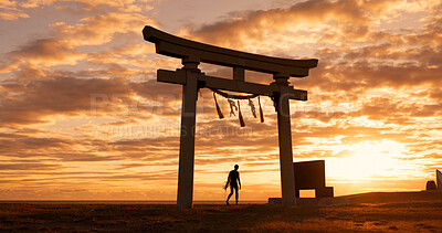 Buy stock photo Torii gate, sunset sky and man at ocean with surfboard, spiritual history and travel adventure in Japan. Shinto architecture, Asian culture and calm beach in Japanese nature with sacred monument.