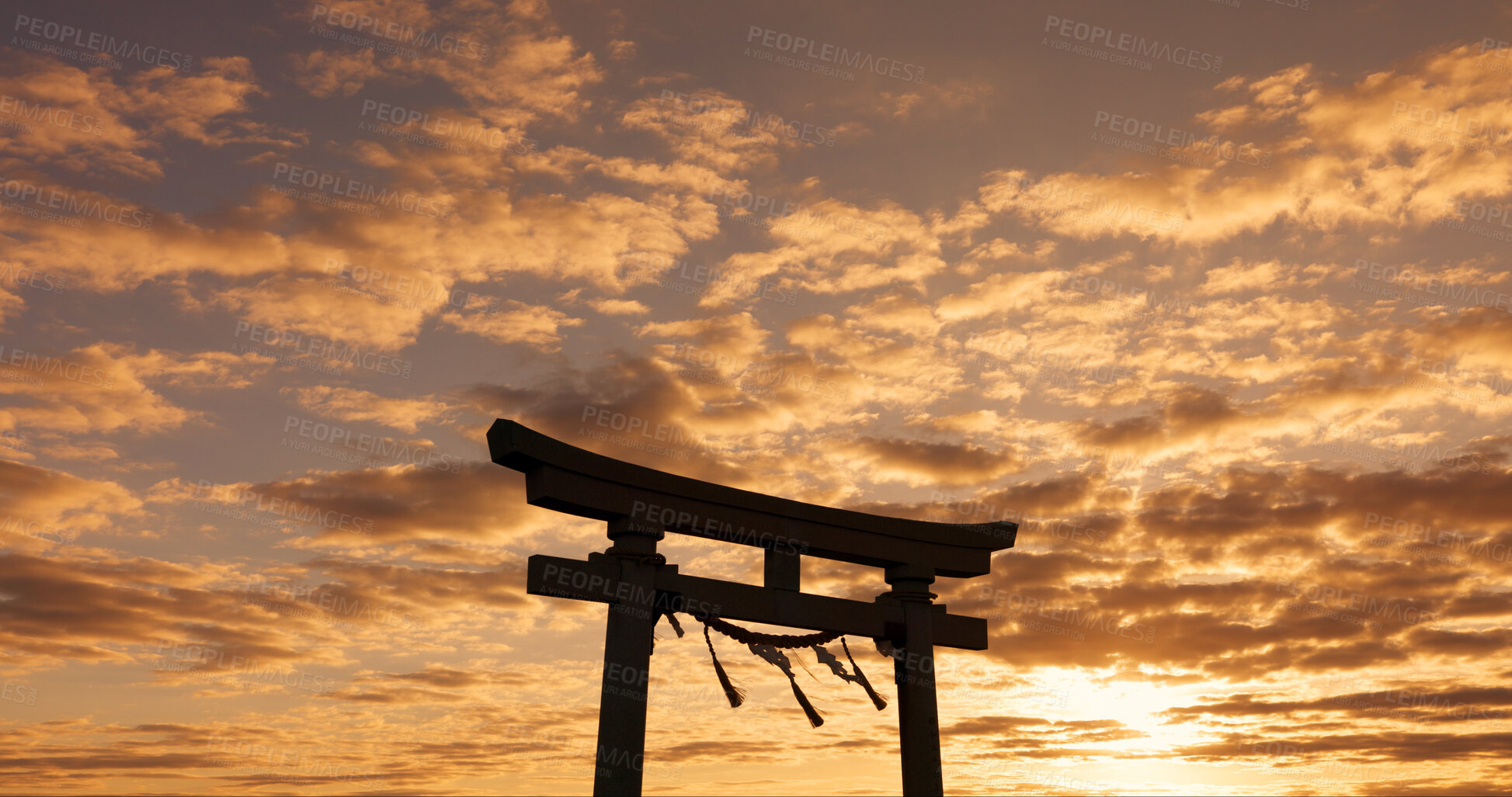 Buy stock photo Torii gate, sunset sky in Japan with nature, zen and spiritual history on travel adventure. Shinto architecture, Asian culture and calm clouds on Japanese landscape with sacred monument at shrine.