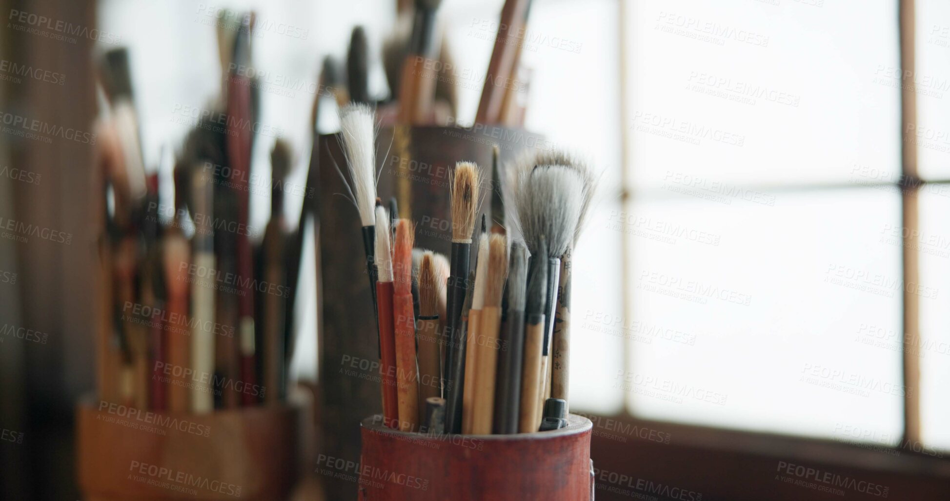 Buy stock photo Paint brush, equipment and supplies in empty workshop closeup for art, creative or talent showcase. Studio interior or room with still life objects for artistic creativity or artwork drawing