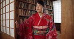Japanese, woman and kimono with relax for culture, tea ceremony and thinking or ideas in Chashitsu. Thoughtful, person and vintage dress or fashion for temae, ritual and waiting for hospitality