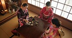 Japanese, women and kimono for tea ceremony in Chashitsu room with matcha or custom tradition. People, temae and vintage style dress or top view for culture, fashion and honor with antique crockery
